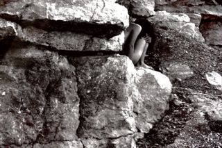 Woman in the Rocks